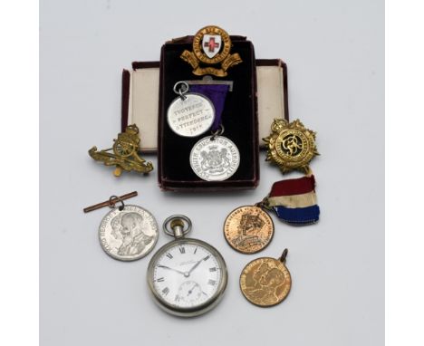 A small mixed collection to include military badges, King George VI coronation medal, medal to commemorate silver Jubilee of 