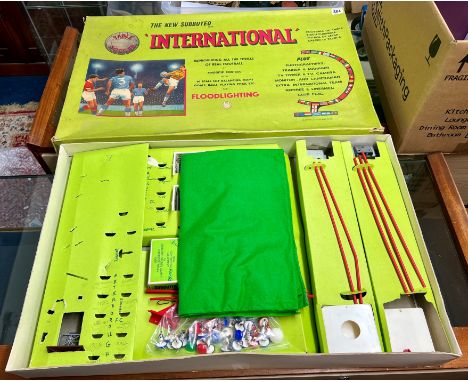 The New Subbuteo International Table Soccer vintage board game, including scale self balancing teams, goals, balls and playin