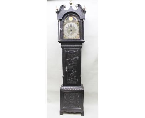 J.W. RICHARDSON OF DARLINGTON AN EBONISED 19TH CENTURY CARVED OAK LONGCASE CLOCK, having arched moon phase face, cast spandre