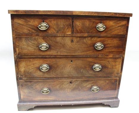 A 19TH CENTURY MAHOGANY CHEST OF DRAWERS, with inlaid rectangular top over two inline and three graduating full width drawers