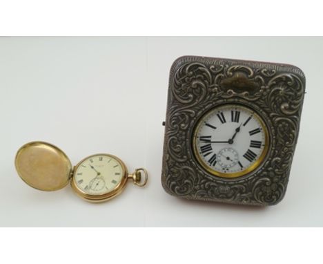 AN EDWARDIAN EMBOSSED SILVER FRONTED POCKET WATCH STAND with leather easel back, velvet and silk lined, Birmingham 1903, to c