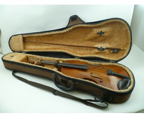 AN EARLY 20TH CENTURY FULL SIZE VIOLIN having two piece back and red/brown varnish, bears interior printed label and ink insc