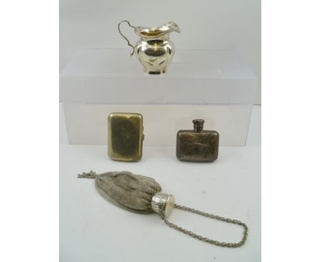 W. AND G. NEAL A LATE VICTORIAN SILVER HIP FLASK of small capacity, London 1891, together with a SILVER CREAM JUG, a plated C