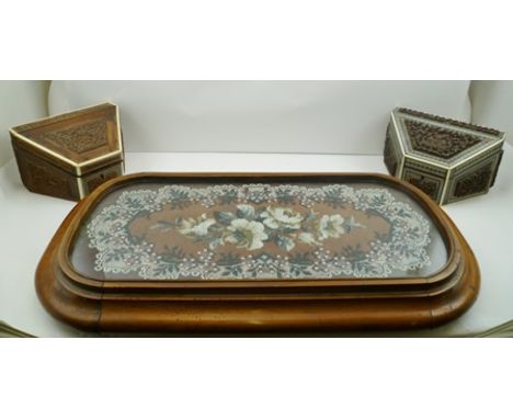 A VICTORIAN TABLE PLATFORM, moulded polished wood frame on bun feet, inset with a floral Berlin bead work panel, 67cm x 37cm,