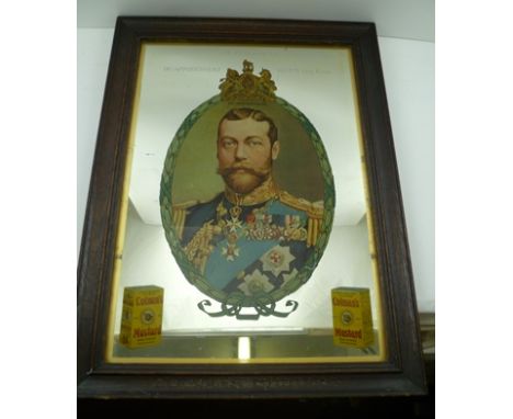 A "COLMAN'S MUSTARD" ADVERTISING MIRROR, having a central portrait of the King (George V) beneath an armorial, within a wreat