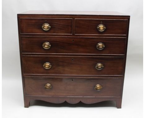A 19TH CENTURY MAHOGANY CHEST OF DRAWERS, having two short over three long graduating drawers, brass oval back plate handles,