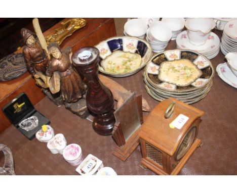 A Baronet of London mantel clock; an Art Deco picture frame; a turned wooden candlestick; a pair of figures and a taxidermy l