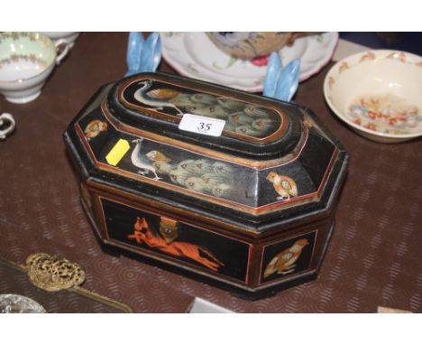 A painted and decorated wooden trinket box depicting various animals