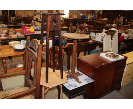 An oak plant stand; a bamboo two tier table; a tile top table; and an oak octagonal topped table 