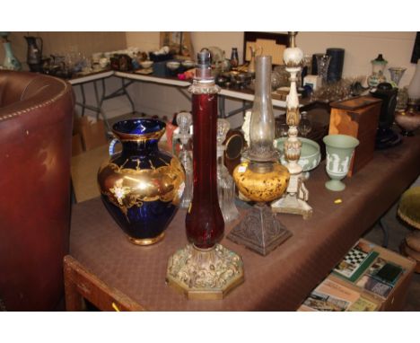 A 19th Century gilt metal and ruby glass table lamp base AF