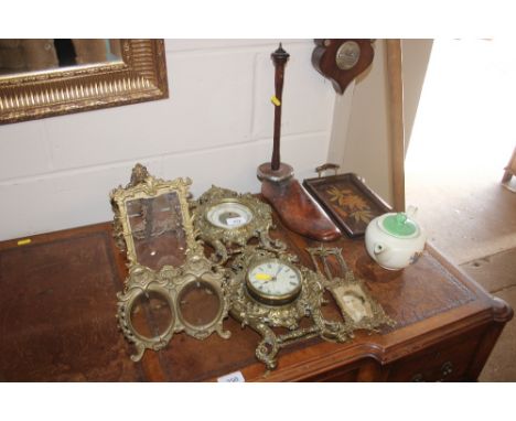 A brass cased barometer and clock; various brass photo frames; an old wooden shoe last etc.