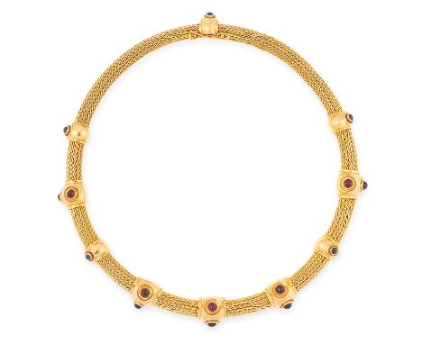 A GEMSET TORQUE NECKLACE, ILIAS LALAOUNIS in 18ct yellow gold, comprising of an interwoven pipe necklace with links jewelled 