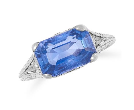 A 3.94 CARAT CEYLON NO HEAT COLOUR CHANGE SAPPHIRE AND DIAMOND RING in platinum and white gold, set with an emerald cut colou