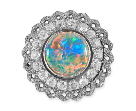 AN ANTIQUE BLACK OPAL AND DIAMOND BROOCH in yellow gold and silver, set with a round cabochon black opal in a cluster of old 