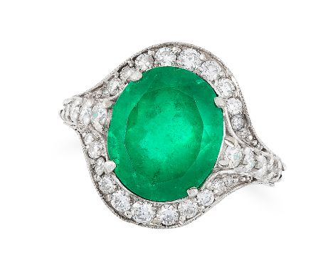 AN EMERALD AND DIAMOND CLUSTER RING set with an oval cut emerald of 6.64 carats in a cluster of round cut diamonds with furth