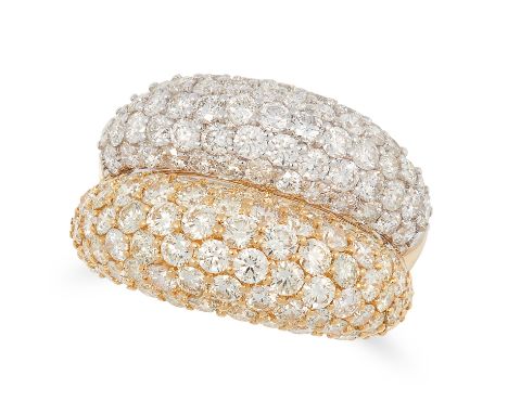 A DIAMOND TWO TONE BOMBE RING designed as a double bombe band, set with round cut diamonds totalling 4.5-5.5 carats, tests as