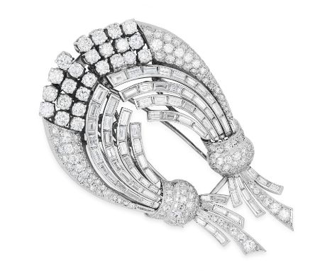 A PAIR OF VINTAGE 18.00 CARAT DIAMOND CLIPS in flower spray design, set with round and baguette cut diamonds totalling approx