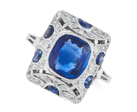 AN ART DECO BURMA NO HEAT SAPPHIRE AND DIAMOND RING in platinum, set with a cushion cut sapphire of 2.83 carats in a bevelled