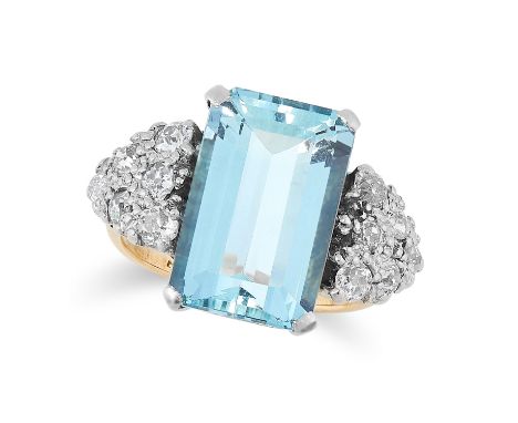 AN ART DECO AQUAMARINE AND DIAMOND RING in yellow gold, set with an emerald cut aquamarine of 5.00 carats, between triangular