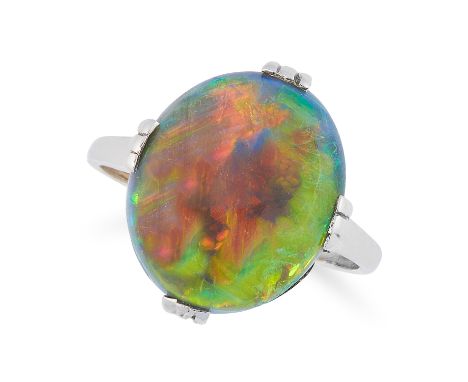 A BLACK OPAL DRESS RING set with a cabochon black opal of 5.19 carats, unmarked, size L / 6, 4.8g.