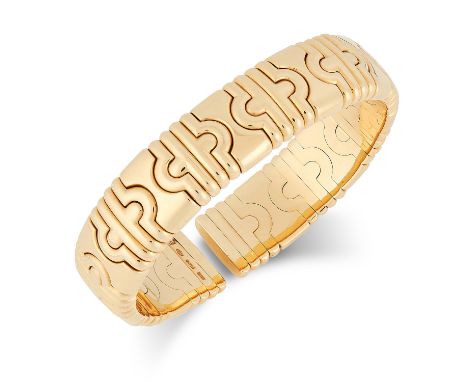 A PARENTESI CUFF BANGLE, BULGARI in 18ct yellow gold, comprising of gold modular links, signed Bulgari, stamped 750, 5.6cm / 