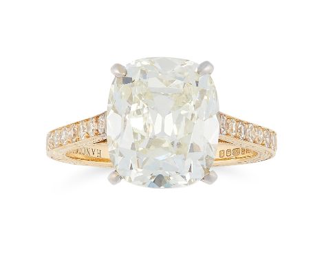 A 5.72 CARAT DIAMOND RING in 18ct yellow gold, claw set with an antique cushion cut diamond of 5.72 carats, the shank and gal
