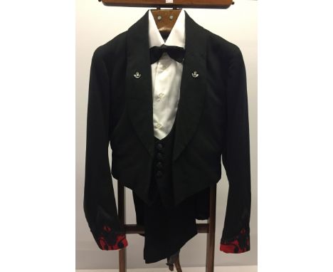 Early to mid 1900s pattern (shirt & tie later).