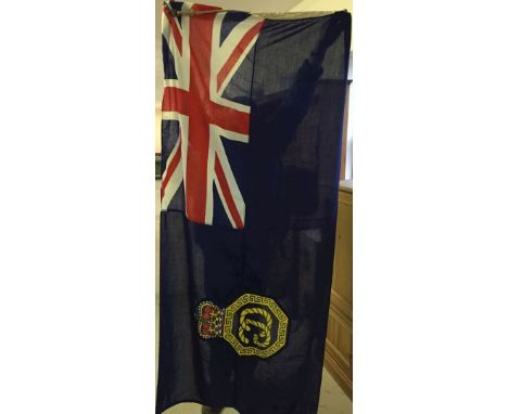 A vintage HM Coastguard blue ensign flag 81 x 178cm (2' 8" x 5' 10") with letter of provenance from current owner. 