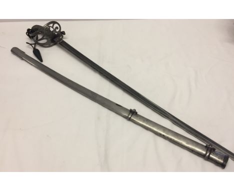 By Henry Wilkinson, Pall Mall, London with steel scabbard. Slightly curved blade etched with Rifle Brigade name, bugle horn, 