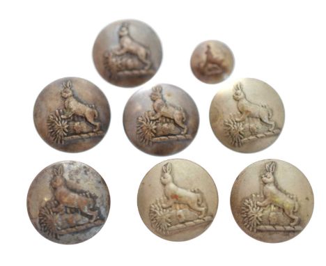 A set of eight hare coursing buttons, including seven larger buttons and one smaller button, marked 'Special Quality' to reve