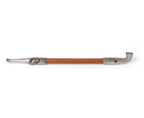 A Japanese Mixed Metal Kiseru Pipe, Meiji period, the white metal mounts inlaid and engraved with a figure seated on a rock w
