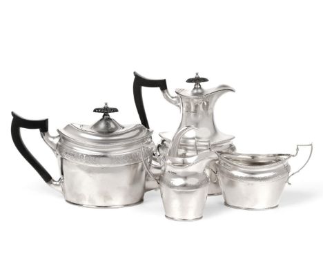 A Silver Four Piece Tea Service, Mappin & Webb, Sheffield 1921, navette shape with a band of engraved decoration and ropework