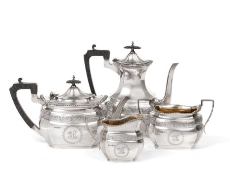 A George V Four Piece Silver Tea Service, Walker and Hall, Sheffield 1911, shaped oval form and of George III influence, with
