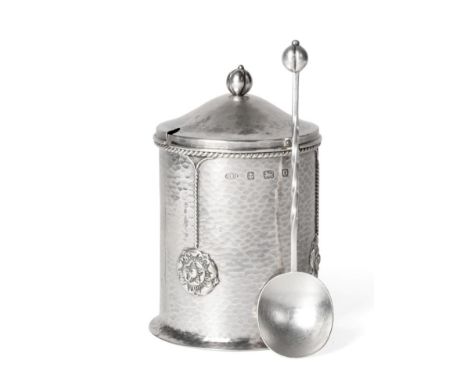 An Arts and Crafts Silver Preserve Pot, Cover and Spoon, A.E.Jones, Birmingham 1913, cylindrical with planished finish, ropew