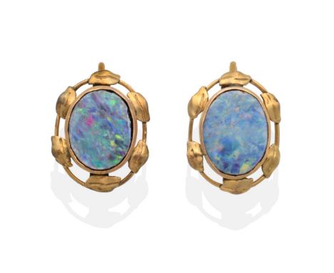 A Pair of Arts & Crafts Opal Doublet Earrings, an oval opal doublet in a rubbed over setting within a leaf frame, measure 1.5