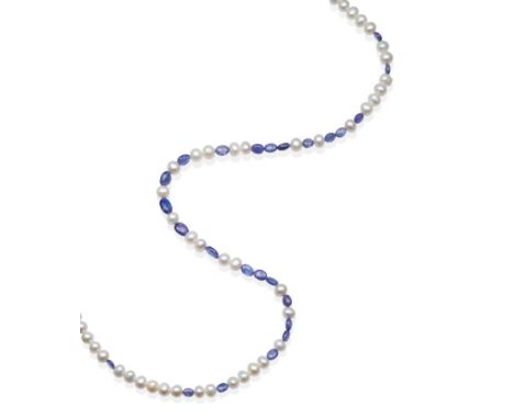 A Tanzanite and Pearl Necklace, smooth oval tanzanite beads spaced by groups of cultured pearls, length 63cm see illustration