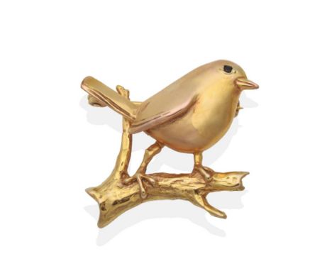 A 9 Carat Gold Robin Brooch, by Harriet Glen, modelled as a matt polished robin with a sapphire set eye, perched upon a brigh