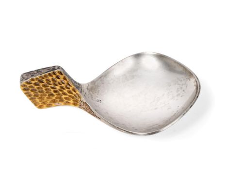 Stuart Devlin: A Silver Caddy Spoon, London, with gilt textured handle, 7.5cm long, 1oz 4dwt