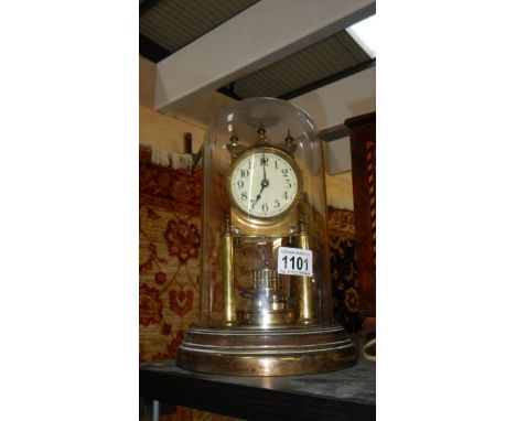 A Gustav Becker anniversary clock under glass done