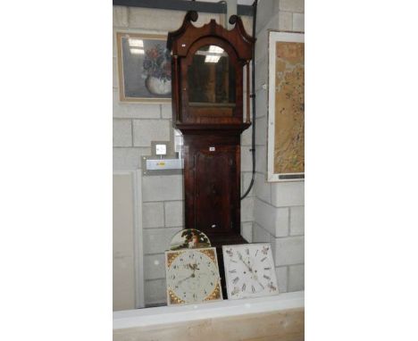 A Victorian mahogany Grandfather clock and 2 Grandfather clock movements