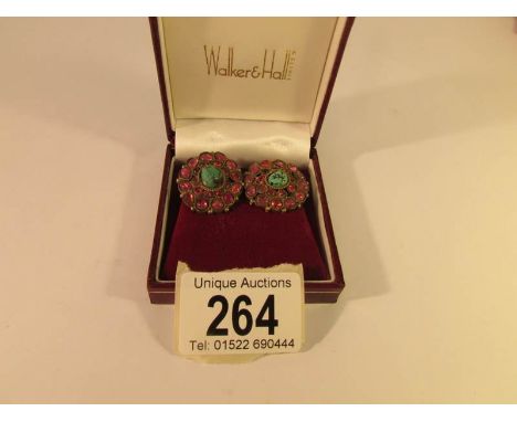 A pair of mid 20th century foiled back ruby and turquoise ear clips