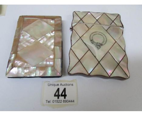 A mother of pearl card case and a French mother of pearl faced note pad