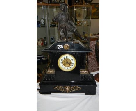 A tall heavy slate mantel clock