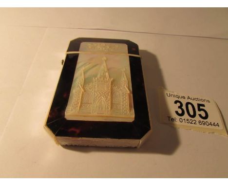 A 19th century mother of pearl card case depicting a church, 9 x 5.5 cm