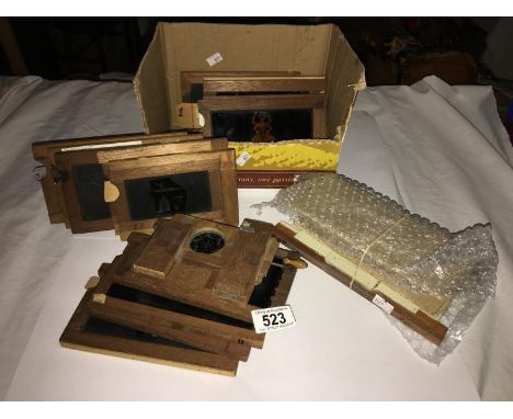 15 Victorian magic lantern slides and spare carriers, 2 boxes