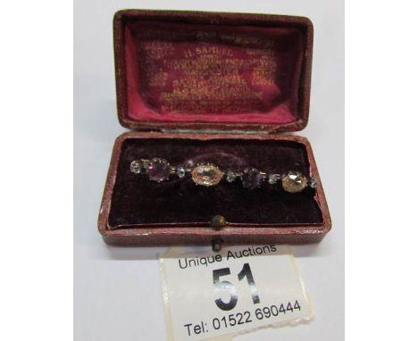 An antique amethyst, citrine and diamond brooch in original boxBrooch is 6cm long  Largest stone is 8mm x 6mm