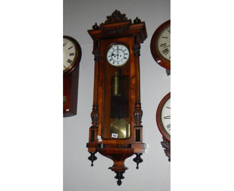 A good Victorian 2 weight walnut Vienna clock
