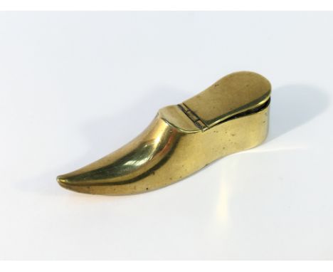 A Victorian brass shoe snuff box