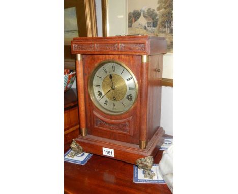 An oak bracket clock