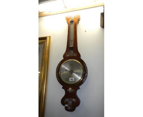 A mother of pearl inlaid barometer with mercury thermometer